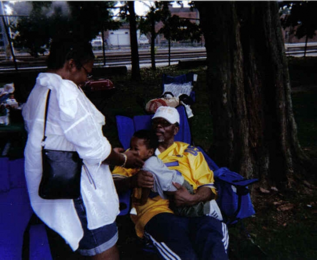 Henny Chandler talking with family