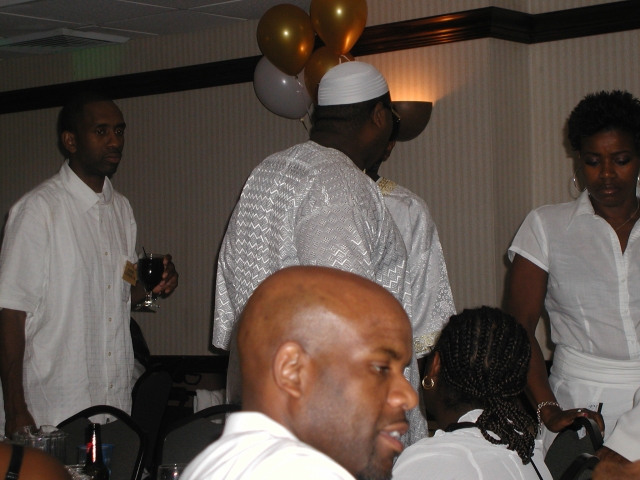 (far left) Pierre Chandler, Dwight Collins and sister Cheryl Collins-Belcher in the backgrond & (front) Drew Chandler