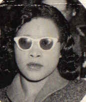 Pearl Chandler-Goodrich wearing the  white frame sunglasses looking like a glamour girl.
