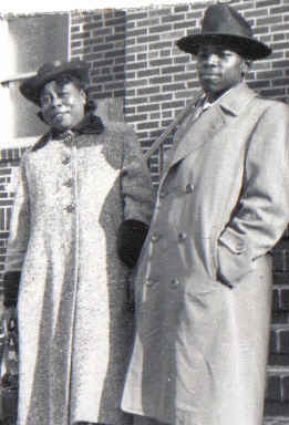 Lola Collins-Chandler with son Elmer (Buddy-cup)wearing those hats & coats from back in the day.